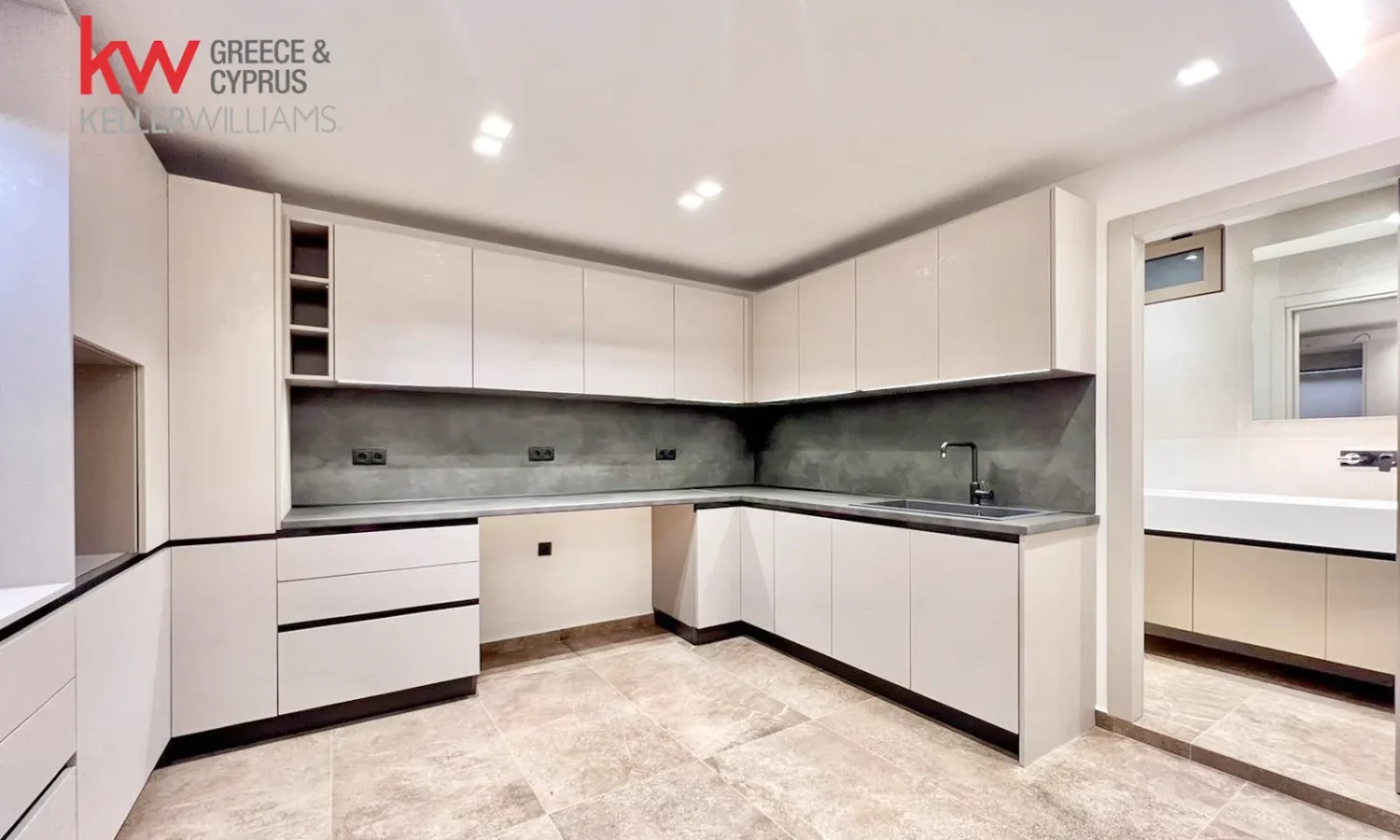 Modern kitchen with sleek cabinetry.